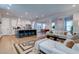 Open concept kitchen and living area with island and hardwood floors at 1525 Kepley Dr, Mount Pleasant, SC 29464