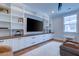 Spacious media room with built-in shelving and large TV at 1525 Kepley Dr, Mount Pleasant, SC 29464