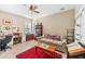 Cozy home office with a ceiling fan, neutral tones, and a comfortable seating area at 163 Oakbluff Rd, Summerville, SC 29485