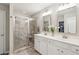 Double vanity bathroom with a large walk-in shower and great storage at 1654 Sparkleberry Ln, Johns Island, SC 29455