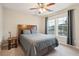 Cozy bedroom with a comfortable bed, large window, and ample natural light at 1654 Sparkleberry Ln, Johns Island, SC 29455