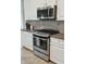 Stainless steel appliances and granite countertops at 1654 Sparkleberry Ln, Johns Island, SC 29455