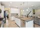 Modern kitchen with stainless steel appliances and island at 1654 Sparkleberry Ln, Johns Island, SC 29455