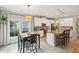 Modern kitchen with white cabinets, granite counters, and island at 1654 Sparkleberry Ln, Johns Island, SC 29455