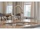 Modern kitchen sink with a pull-down faucet at 1654 Sparkleberry Ln, Johns Island, SC 29455