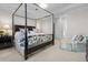 Elegant Primary bedroom with a four-poster bed and ensuite bathroom at 2020 Parish House Cir, Johns Island, SC 29455