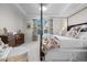Elegant Primary bedroom with a four-poster bed and ensuite bathroom at 2020 Parish House Cir, Johns Island, SC 29455