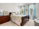 Bedroom with a sleigh bed and blue accents at 2020 Parish House Cir, Johns Island, SC 29455