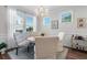 Bright dining area features a round table, built-in bench seating, and hardwood floors at 2020 Parish House Cir, Johns Island, SC 29455