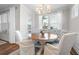 Bright dining room features a charming table and chairs, perfect for Gathering meals at 2020 Parish House Cir, Johns Island, SC 29455