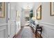 Bright entryway with hardwood floors and console table at 2020 Parish House Cir, Johns Island, SC 29455
