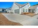Gray house with gray garage and driveway at 2020 Parish House Cir, Johns Island, SC 29455