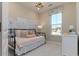 Charming bedroom with daybed, cityscape mural, and ample natural light at 210 Yorkshire Dr # 6, Moncks Corner, SC 29461