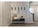 Modern entryway with bench, hooks, and wood-look floors at 216 Yorkshire Dr # 3, Moncks Corner, SC 29461