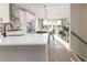 Modern kitchen with white cabinets and a large island at 216 Yorkshire Dr # 3, Moncks Corner, SC 29461