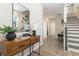 Bright and airy entryway with wood-look floors and a console table at 218 Yorkshire Dr # 2, Moncks Corner, SC 29461