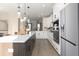 Modern kitchen with island, stainless steel appliances, and white cabinetry at 218 Yorkshire Dr # 2, Moncks Corner, SC 29461