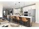 Open concept kitchen features an island with seating and stainless steel appliances at 218 Yorkshire Dr # 2, Moncks Corner, SC 29461