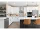 Modern kitchen with white cabinets, quartz countertops, and stainless steel appliances at 218 Yorkshire Dr # 2, Moncks Corner, SC 29461