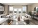 Bright living room with French doors opening to a balcony at 218 Yorkshire Dr # 2, Moncks Corner, SC 29461