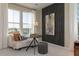 Cozy sitting area with a comfortable chair and large windows at 218 Yorkshire Dr # 2, Moncks Corner, SC 29461
