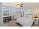 Bright bedroom with a comfortable bed, desk, and ample closet space at 219 Oak Point Landing Dr, Mount Pleasant, SC 29464