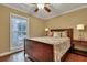 Bright bedroom with hardwood floors and a double bed at 2216 S Dallerton Cir, Charleston, SC 29414