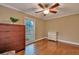Bedroom with hardwood floors and a dresser at 2216 S Dallerton Cir, Charleston, SC 29414