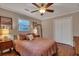 Cozy bedroom with hardwood floors and double doors at 2216 S Dallerton Cir, Charleston, SC 29414