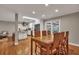 Open concept dining area with hardwood floors and view of kitchen at 2216 S Dallerton Cir, Charleston, SC 29414