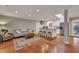 Open concept kitchen with granite island, stainless steel appliances, and hardwood floors at 2216 S Dallerton Cir, Charleston, SC 29414