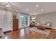 Bright living room with hardwood floors and a cozy seating area at 2216 S Dallerton Cir, Charleston, SC 29414