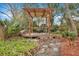 Wooden pergola and deck with garden view at 2216 S Dallerton Cir, Charleston, SC 29414