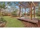 Wooden pergola and deck in backyard setting at 2216 S Dallerton Cir, Charleston, SC 29414