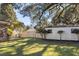 Backyard with storage shed and mature trees at 2383 Erskine Ct, Charleston, SC 29414
