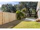 Fenced backyard with patio and storage shed at 2383 Erskine Ct, Charleston, SC 29414