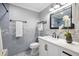 Modern bathroom with gray tile and white vanity at 2383 Erskine Ct, Charleston, SC 29414