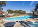 Relaxing community pool with hot tub and surrounding patio at 2383 Erskine Ct, Charleston, SC 29414