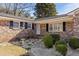 Brick front porch with walkway, landscaping, and bird bath at 2383 Erskine Ct, Charleston, SC 29414