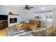 Living room with fireplace, hardwood floors, and comfy seating at 2383 Erskine Ct, Charleston, SC 29414