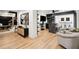 Finished basement with wet bar, seating area, and hardwood floors at 2737 Sarazen Dr, Mount Pleasant, SC 29466