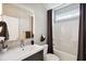 Clean bathroom with single sink, shower/tub combo, and updated vanity at 2737 Sarazen Dr, Mount Pleasant, SC 29466