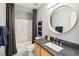 Clean bathroom with shower/tub combo, granite vanity, and updated fixtures at 2737 Sarazen Dr, Mount Pleasant, SC 29466