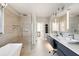 Spa-like bathroom with double sinks, soaking tub, and walk-in shower at 2737 Sarazen Dr, Mount Pleasant, SC 29466