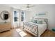 Bright bedroom with hardwood floors and a metal bed frame at 2737 Sarazen Dr, Mount Pleasant, SC 29466