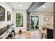 Breakfast bar with stools, and view of backyard from window at 2737 Sarazen Dr, Mount Pleasant, SC 29466