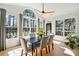 Sun-drenched dining room with a picturesque view and hardwood floors at 2737 Sarazen Dr, Mount Pleasant, SC 29466
