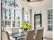 Sun-drenched dining room with a picturesque view and hardwood floors at 2737 Sarazen Dr, Mount Pleasant, SC 29466