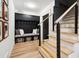 Stylish entryway with built-in bench, storage, and modern staircase at 2737 Sarazen Dr, Mount Pleasant, SC 29466