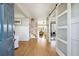 Light-filled entryway with hardwood floors and barn doors leading to living areas at 2737 Sarazen Dr, Mount Pleasant, SC 29466